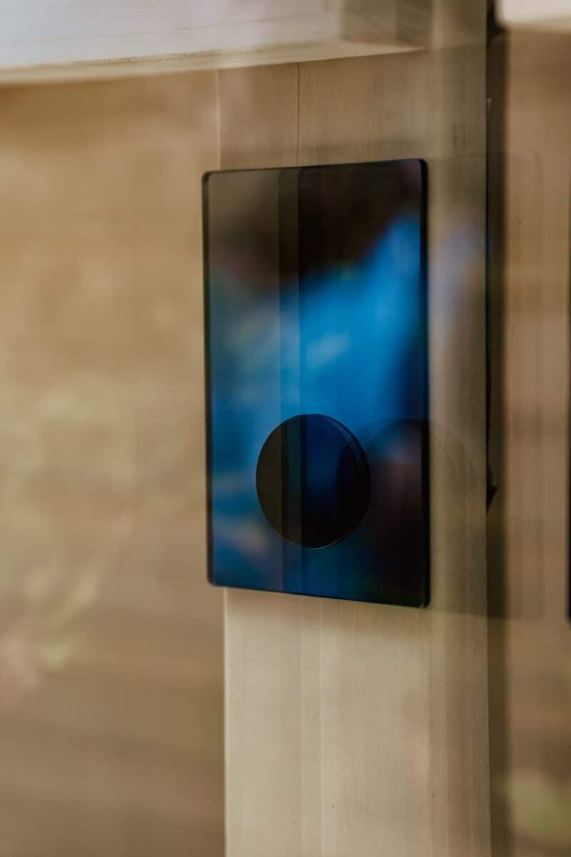a blue rectangle with a black circle on it